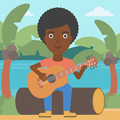 Image showing Woman playing guitar.