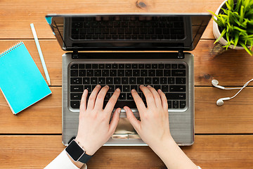 Image showing close up of woman or student typing on laptop