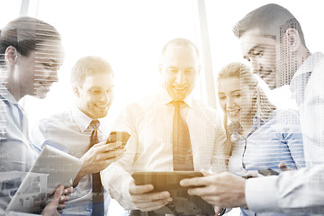 Image showing business people with tablet pc and smartphones