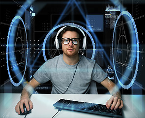 Image showing man in headset with computer virtual projections