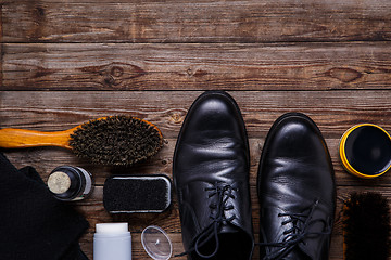 Image showing Shoe wax, brush and boot