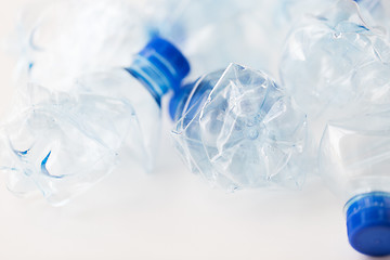 Image showing close up of empty used plastic bottles on table