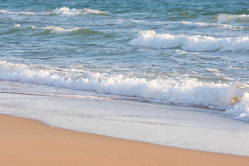 Image showing Sea surf on a sandy beach