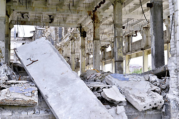 Image showing Pieces of Metal and Stone are Crumbling from Demolished Building Floors