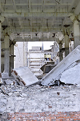 Image showing Pieces of Metal and Stone are Crumbling from Demolished Building Floors