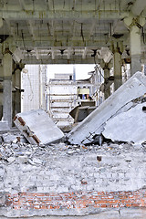 Image showing Pieces of Metal and Stone are Crumbling from Demolished Building Floors