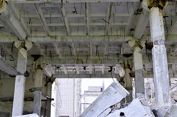 Image showing Pieces of Metal and Stone are Crumbling from Demolished Building Floors