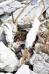 Image showing Pieces of Metal and Stone are Crumbling from Demolished Building Floors