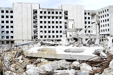 Image showing Pieces of Metal and Stone are Crumbling from Demolished Building Floors