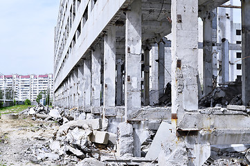 Image showing Pieces of Metal and Stone are Crumbling from Demolished Building Floors