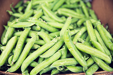 Image showing close up of green peas in box at street market