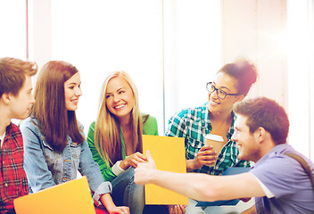 Image showing students communicating and laughing at school