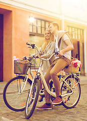 Image showing couple with bicycles in the city