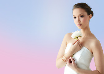 Image showing beautiful asian woman with flower and jewelry