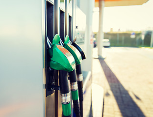 Image showing close up of gasoline hose at gas station