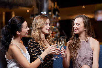 Image showing happy women with champagne glasses at night club