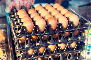 Image showing fresh eggs on tray at asian street market