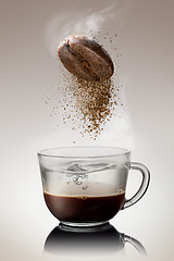 Image showing pours instant coffee in a cup