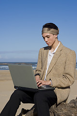 Image showing Working At The Beach