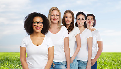 Image showing group of happy different women in white t-shirts