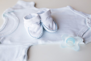 Image showing close up of baby boys clothes for newborn on table