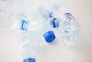 Image showing close up of empty used plastic bottles on table