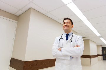 Image showing smiling doctor in white coat at hospital