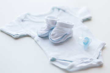 Image showing close up of baby boys clothes for newborn on table