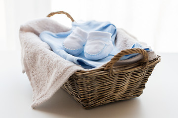 Image showing close up of baby clothes for newborn boy in basket