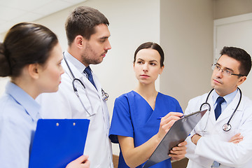 Image showing group of medics with clipboards at hospital