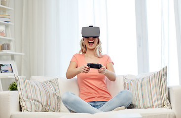 Image showing woman in virtual reality headset with controller