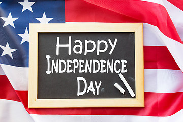 Image showing blackboard ands american flag on independence day