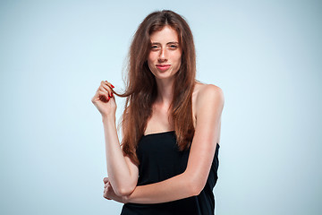 Image showing The young woman\'s portrait with happy emotions