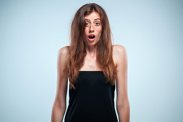 Image showing Portrait of young woman with shocked facial expression