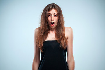 Image showing Portrait of young woman with shocked facial expression