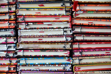 Image showing Stack of colorful notebooks 