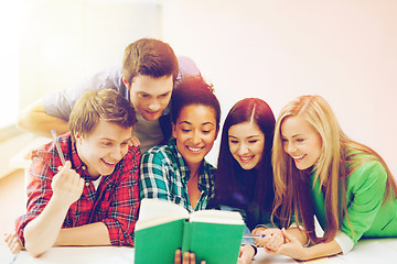 Image showing students reading book at school