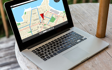 Image showing close up of laptop computer on table at hotel