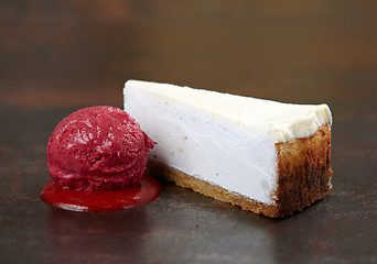 Image showing fresh cheesecake with sorbet ball