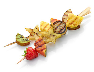 Image showing grilled fruit pieces on skewer