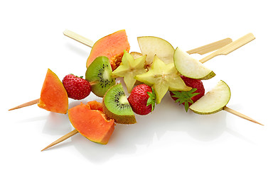 Image showing fresh berries and fruit pieces on skewers