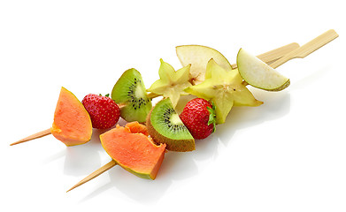 Image showing fresh berries and fruit pieces on skewers