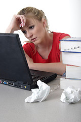 Image showing Girl doing homework on laptop