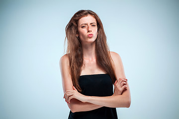 Image showing The thoughtful woman on gray background