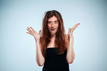 Image showing Portrait of young woman with shocked facial expression