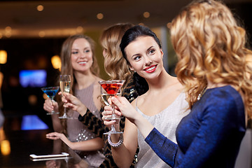 Image showing happy women with drinks at night club