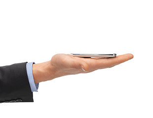 Image showing close up of man hand with smartphone