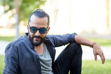 Image showing man in sunglasses at city street or park