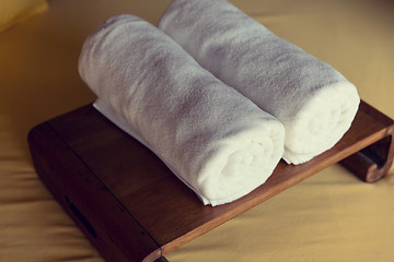 Image showing rolled bath towels at hotel spa