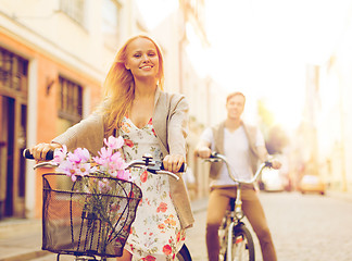 Image showing couple with bicycles in the city